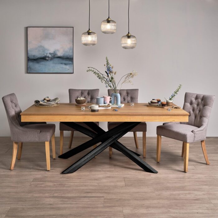 amelia-oak-wood-non-extending-dining-table-black-legs-laura-james-1_d88fd152-ecdc-4a48-811e-d85e4fd1b0a4