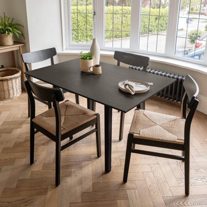 charlie-black-extendable-dining-table-set-4-seater-faye-woven-black-dining-chairs-laura-james-7